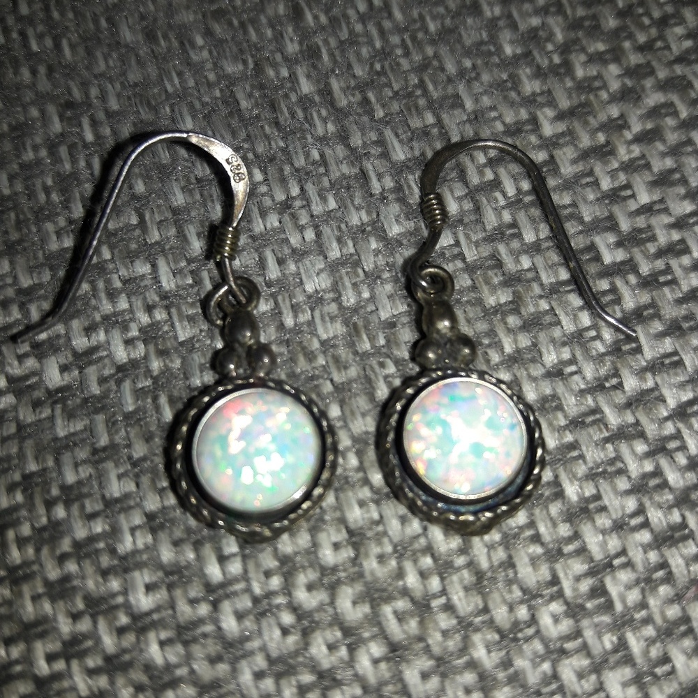 Opal earrings set in sterling silver